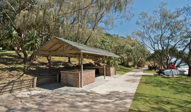 Photo of some of the public barbeques dotted along Wategos Beach
